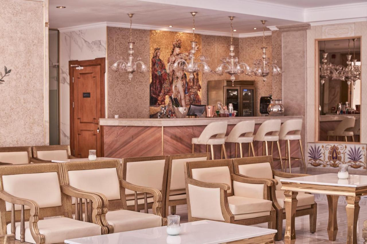 Kairaba Mythos Palace - Adults Only Kouspádhes Kültér fotó The bar at the hotel