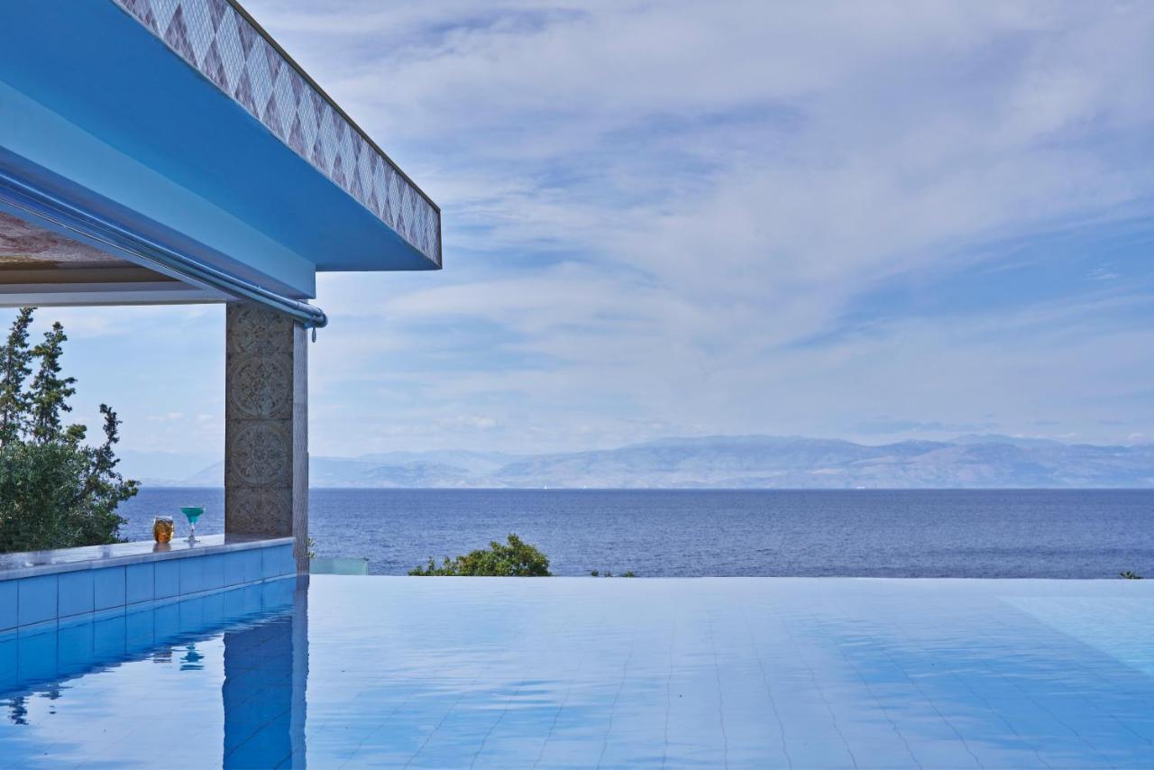 Kairaba Mythos Palace - Adults Only Kouspádhes Kültér fotó Infinity pool at the resort