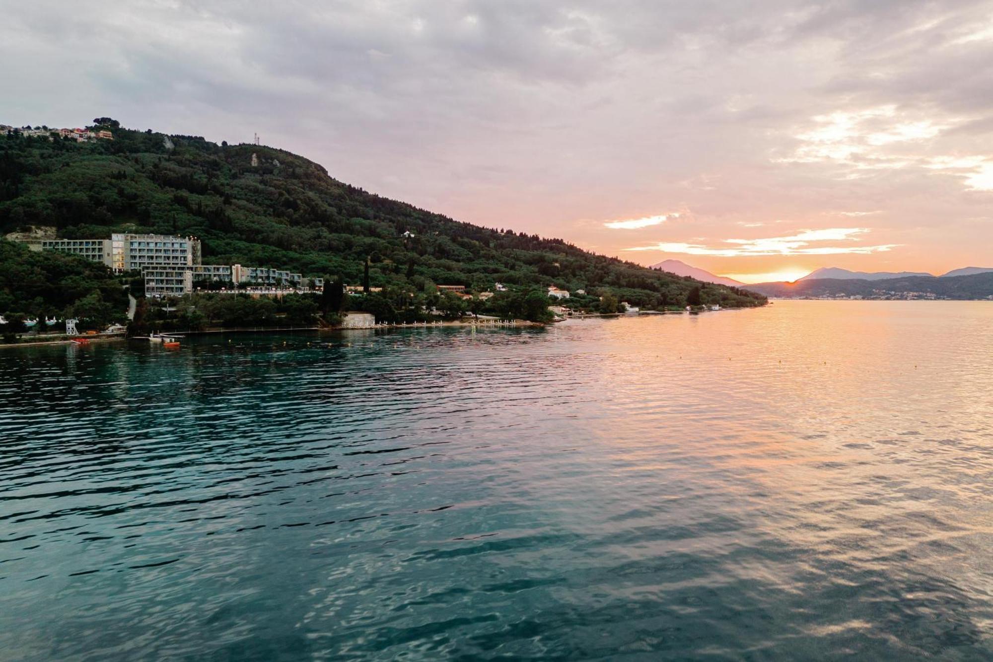 Kairaba Mythos Palace - Adults Only Kouspádhes Kültér fotó Sunset over the Gulf of Corfu